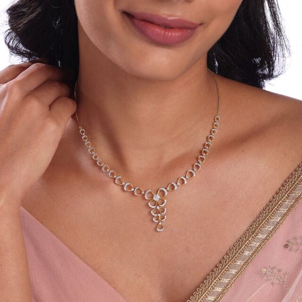 Delicate Bowtie Gold & Diamond Necklace - Image 4